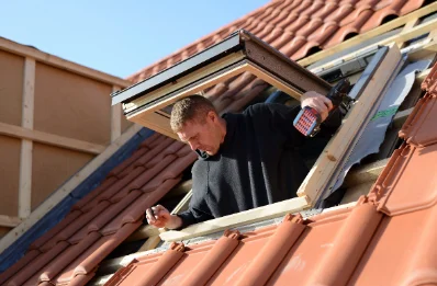 Pose de fenêtres de toit Velux à Bretteville